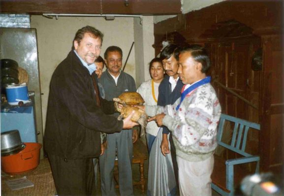 Prof. Dr. Hermann Schleich rescuing tortoises at early 2000